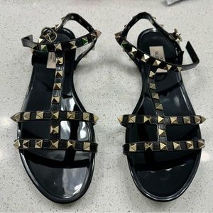 Valentino Garavani
 Black Rockstud Jelly Flat Gladiator Sandals